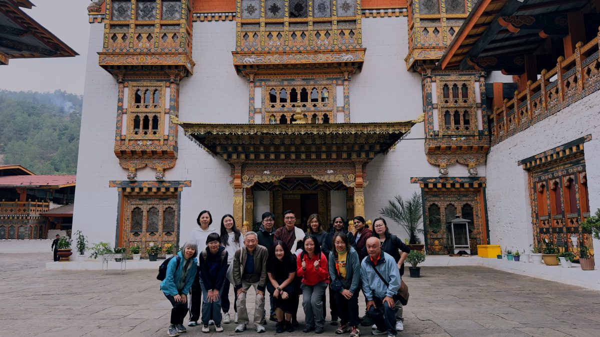 Guests from Singapore in front of Machen Lhakhang, Punakha Dzong